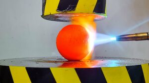 EXPERIMENT Glowing 1000 degree METAL BALL vs HYDRAULIC PRESS 100 TON